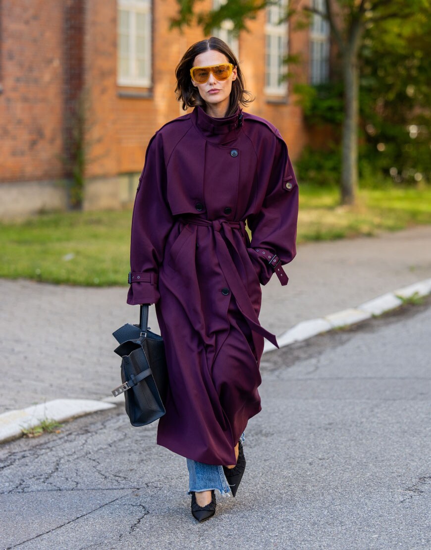 Woman wearing burgundy trench coat | ASOS Style Feed