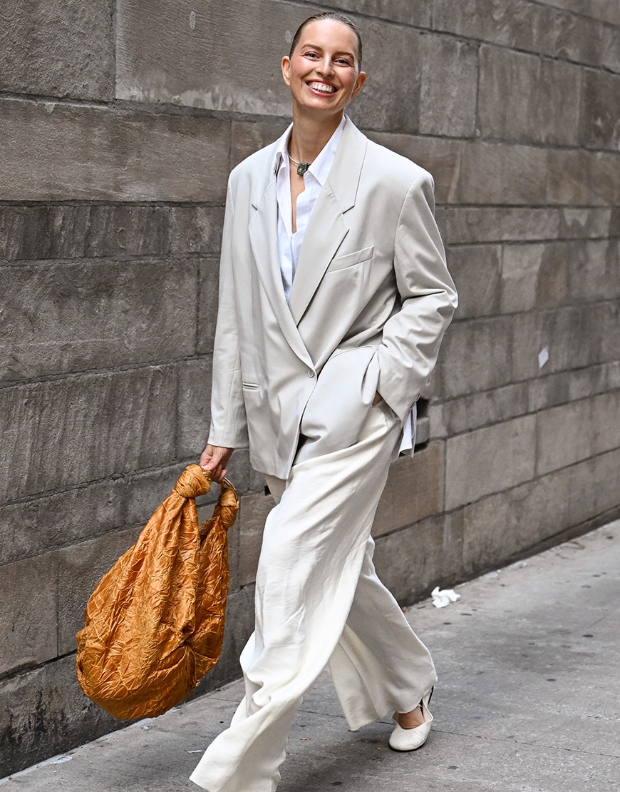 Woman wearing oversized beige suit | ASOS Style Feed